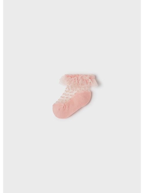 Rózsaszín fodros zokni.